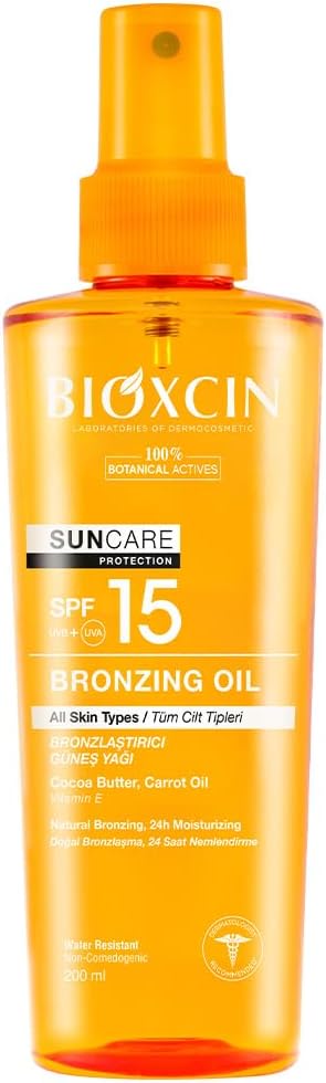 روغن برنزه کننده بدن بیوکسین Bioxcin با spf 15 مناسب انواع پوست حجم 200 میل